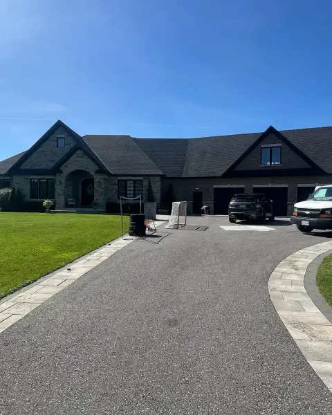Finished paver driveway at the front of the home