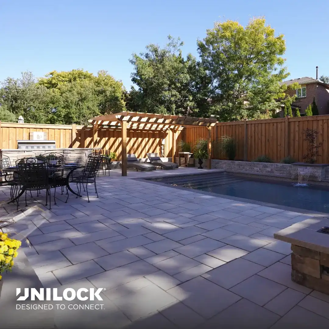 An MWG pool patio used in Unilock marketing