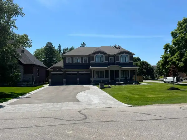 Paver driveway and walkway at a large home
