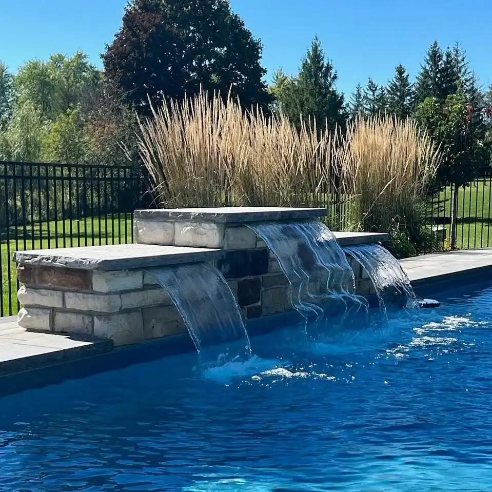 Pool with waterfalls and ornamental grasses