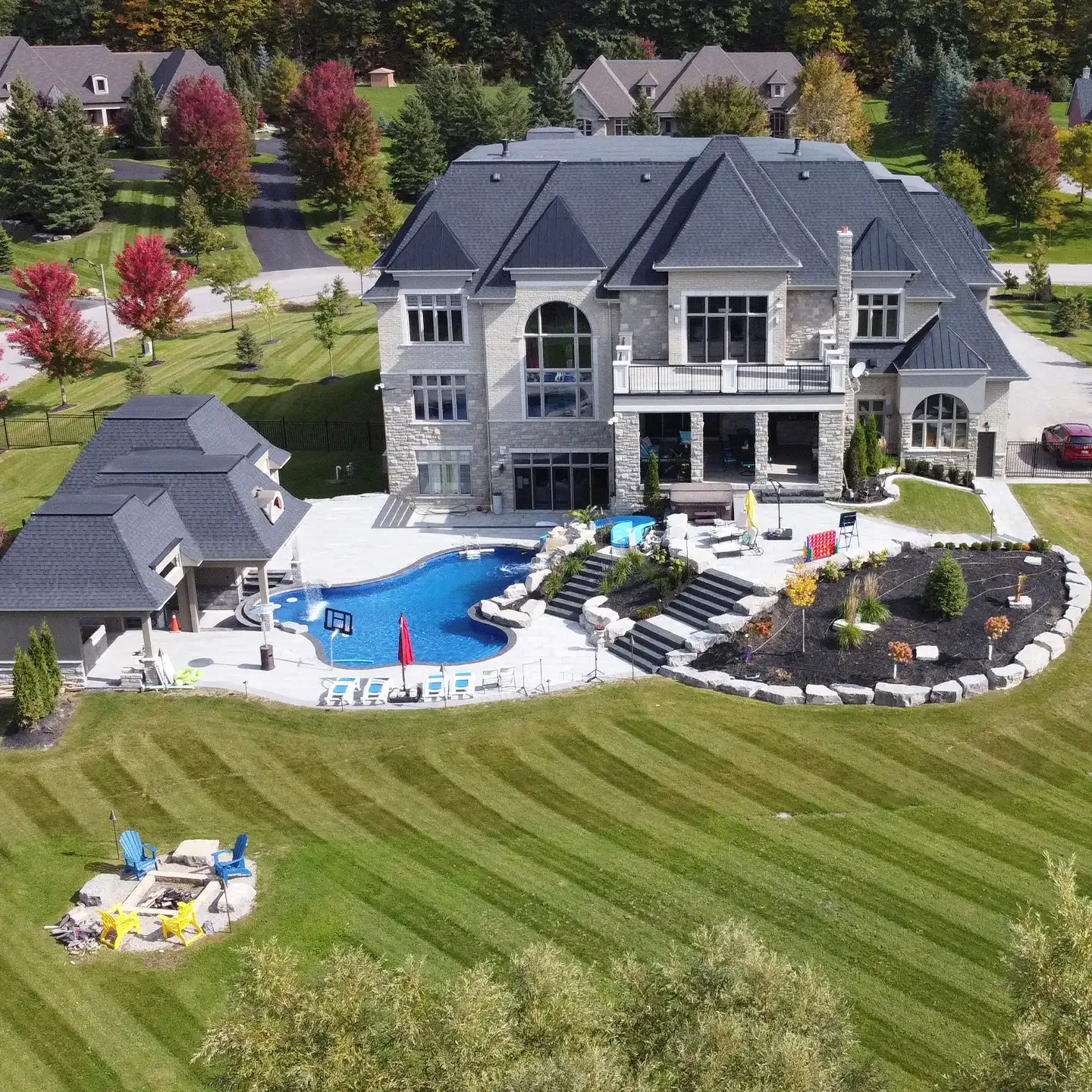 Drone view across the grotto pool and the whole property