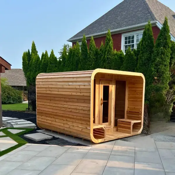 Cedar cube sauna on the paver patio