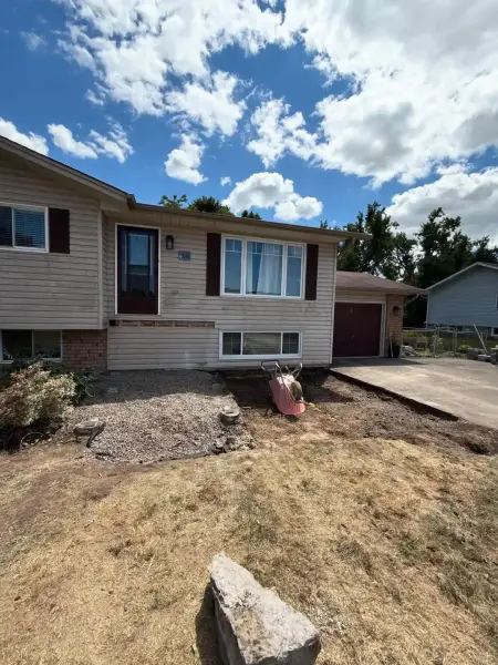 Before, front yard stripped back