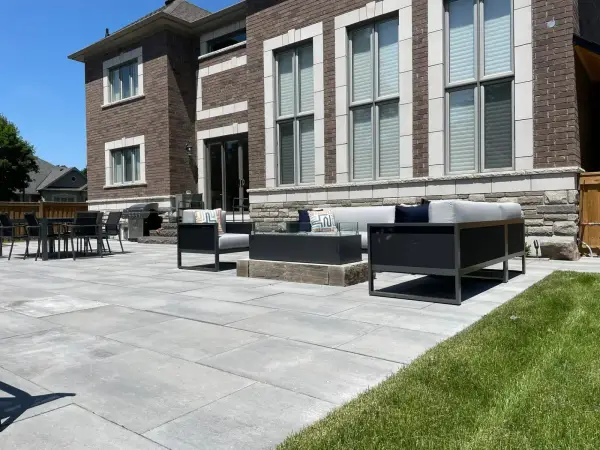 The home, pool and paver patio from the lawn