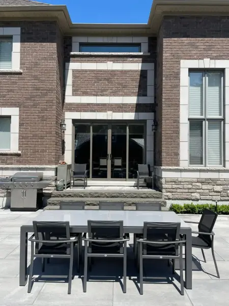 Outdoor kitchen and dining set on the patio